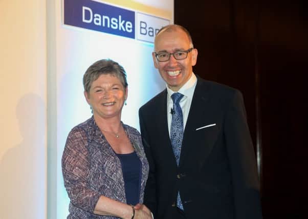 Rosie Oakes pictured with Danske Bank CEO, Kevin Kingston at the awards lunch. INNT 26-813CON