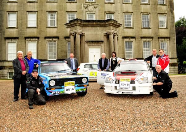Celebrating this year's Lurgan Park rally are, from left, Brian Stinson (Orchard Motorsport), Keith Somerville (event secretary), Frank Kelly (driver), Councillor Glenn Barr (Leisure Services Committee chairman), William Fullerton (event director), the Mayor of Armagh City, Banbridge and Craigavon Borough Council, Councillor
Garath Keating, James Blane (North Armagh Motor Club president), Simon Fullerton (Roadside Motors Ltd), Kenny McKinstry (driver). Pic by Gary Craig.