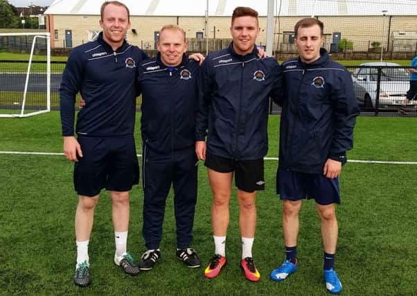 Kevin Doherty, Institute First Team Coach welcomes new signings Dean Curry, Sean McCarron and Stephen Curry at pre-season training on Monday night.