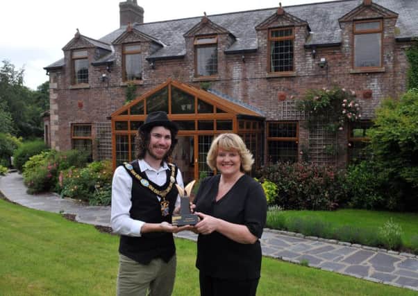 Lord Mayor of Armagh City, Banbridge and Craigavon, Councillor Garath Keating congratulates Mrs Joyce Brownless of Blackwell House, Scarva on winning the Northern Ireland Tourism, Serviced Accommodation Award.