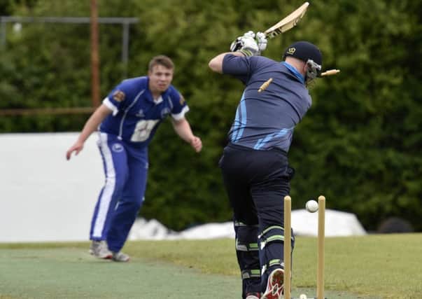 The bails fly as Glendermott batsman Simon Killen is bowled out during Sunday's match against Muckamore. INLS2716-162KM