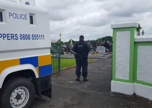 PSNI at a security alert at St Coleman's Graveyard in Lurgan today Thursday 30-6-16