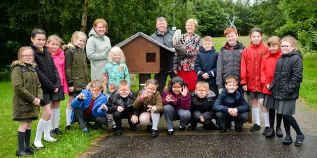 Mayor Audrey Wales pictured with Ballykeel PS pupils who helped build barn owl nest boxes. (Submitted Picture).