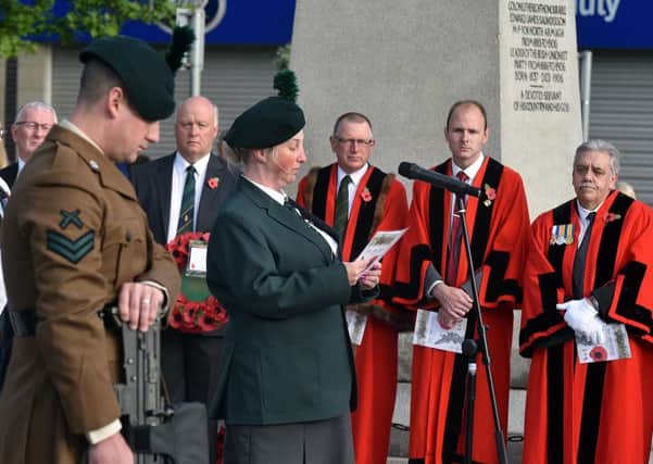 The names of the local fallen are read out during Friday's early morning 100th anniversary Somme commemoration ceremony in the Town Centre. INPT27-203.