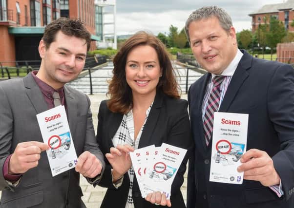 Ronan Convery, Consumer Council; Laura Kane, Trading Standards Service and Gabriel Moran, Police Service of Northern Ireland are pictured with the new Scams - Know the signs ...stop the crime leaflet, which aims to help raise awareness of the different types of scams, as well as the things to look out for and most importantly how to report a scam. (Submitted Picture).