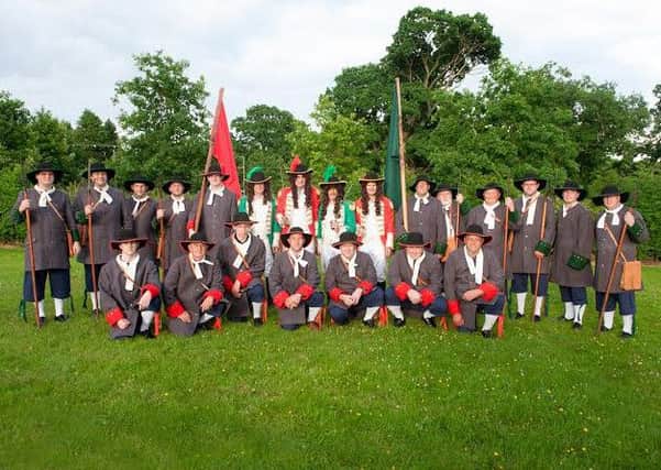 The armies of King William and King James pictured in their new uniforms for this years Sham Fight in Scarva on July 13. The uniforms were designed to be as lifelike as possible to those worn by both sides in the Williamite Wars.