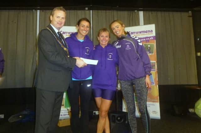 Springwell Ladies receive the Ladies Team Prize at the Jude Gallagher 10 Mile Road Race