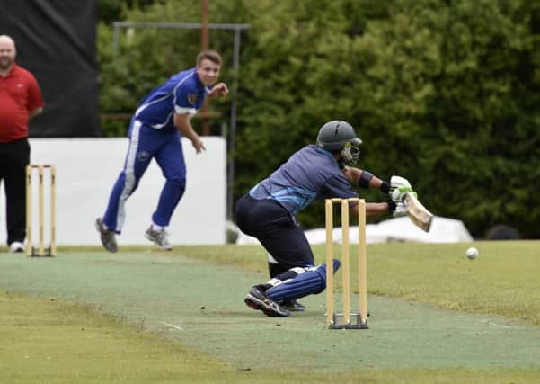 Glendermott batsman Azeem Ghumman stretches for this ball during their match against Muckamore. INLS2716-168KM