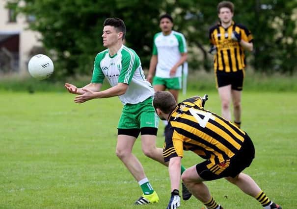 Substitute Caolan McKeown was assured on the ball for St Comgall's.