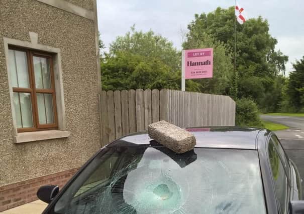 A breeze block appears to have been used to cause damage to a car at Bannfoot near Charlestown