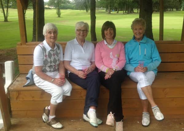 Members enjoying refreshments at the 9th Hut with Lady Captain Elaine Mark.