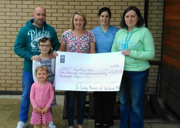 Â£1635 was donated to the Macmillan Unit in Antrim in loving memory of  Valerie Millar, who passed away in the unit earlier this year after an 18 month battle with cancer. Included in the photo are Dee Kenny, Dee Kenny, Katie Kenny, Stephanie Kenny, Julie McCallion (Macmillan nurse) and  Angela Wallace.Submitted image.