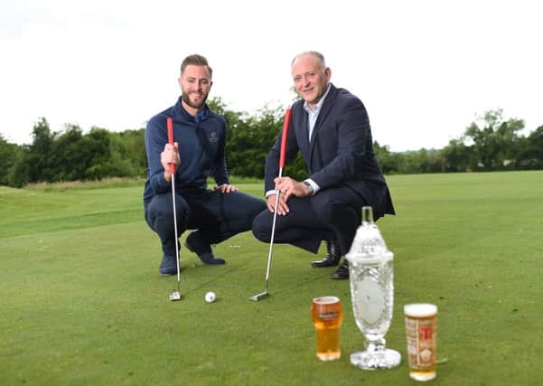 Ross Oliver, Event Manager of the NI Open, is pictured (left) with Jeff Tosh, Sales Director for Tennents NI, and the winners trophy, announcing that Tennents NI will be a Main Sponsor and driving force behind the event at Galgorm Castle GC (July 28-31).  Photo by Marie Therese Hurson.