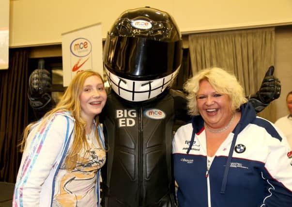 Sarah Agnew and Jenny Agnew from Maghaberry with Big Ed at the MCE Ulster Grand Prix Meet the Riders event at Ramada Plaza Hotel, Belfast on 4th July.