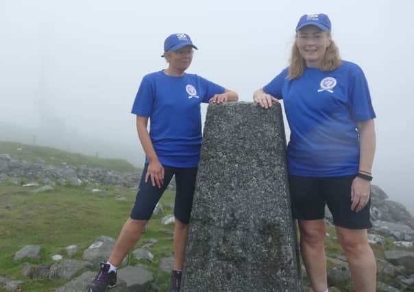 Karen and Gwyneth at the top of Slieve Croob at the beginning of their walk.