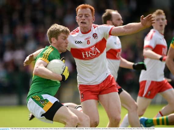 Darragh Smyth of Meath in action against Conor McAtamney of Derry during the GAA Football All-Ireland Senior Championship - Round 2A match between Derry and Meath at Derry GAA Centre of Excellence in Owenbeg, Derry. Photo by Oliver McVeigh/Sportsfile