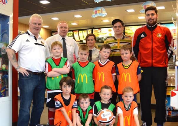 Carniny Amateur and Youth FC were delighted to receive some training kit from club sponsors McDonald's Restaurant, Ballymena. Included is Franchise Manager Kadian O'Reilly.