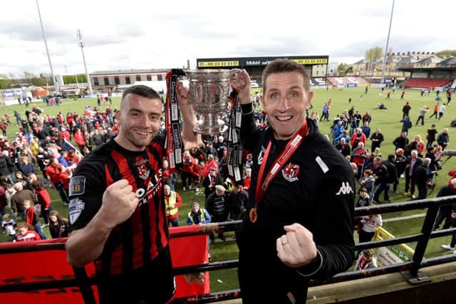 Press Eye - Northern Ireland -23rd April 2016
Photograph: Stephen  Hamilton /Presseye

Danske Bank Irish premier league match between Crusaders and Coleraine at Seaview Belfast.
Crusaders Colin Coates and manager Stephen Baxter  celebrates with the Gibson cup