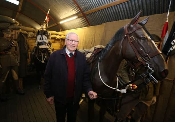 Pictured with the warhorse exhibit is Ballymoney Royal British Legion Member, John McLaughlin. INBM30-16S