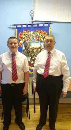The youngest member of Moyarget Chosen Few LOL 1196 John McGregor Junior had the honour of unfurling a new banner for the Lodge at the weekend. Pictured with his father also John McGregor.