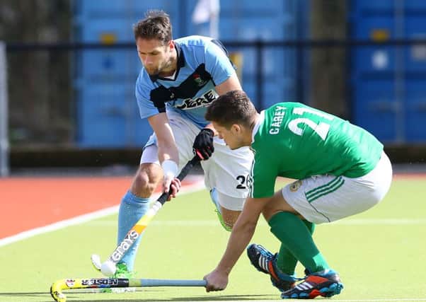 Press Eye - Belfast - Northern Ireland - 09th April 2016 - Photo by William Cherry
Lisnagarvey's Paul Gleghorne with Glenanne's Daryl Carey during Saturdays EY Hockey League match at Comber Road.