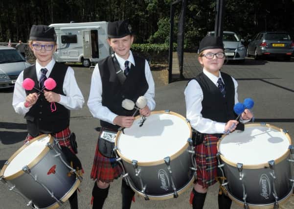 Aimee McBurney, Amy Magee and Ellie Wilson all Tenor drummers with Ballyboley Pipe Band. INLT 28-059-AM