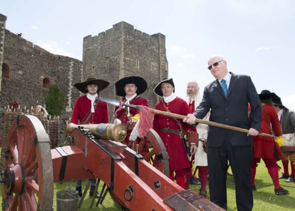 Councillor Billy Ashe, chair of Mid and East Antrim Council's Economic Development and Tourism Committee, joins Schomberg's forces and fires the first cannon of the event. INCT 29-701-CON