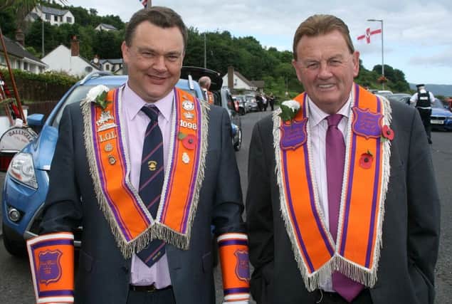 Gary Walsh, left, from LOL. 1098, along with Braid LOL 18 member Tommy Douglas before the start of the Twelfth parade in Glenarm.