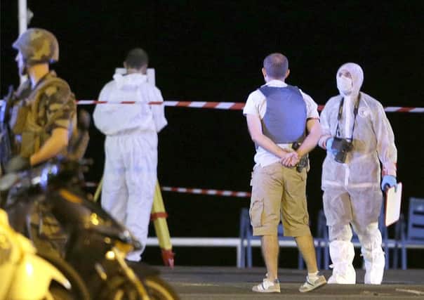 Forensic officers examine evidence from Nice attack AP, 15-07-16