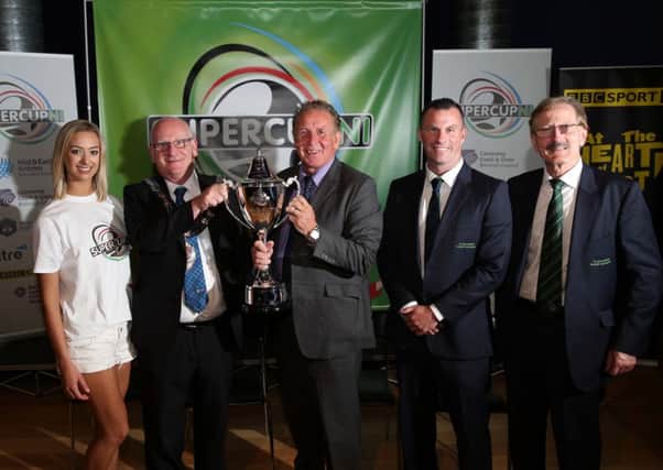 Pictured at the recent launch of the SuperCupNI were outgoing Mayor of Mid and East Antrim Borough Council, Councillor Billy Ashe, NI football legend, Gerry Armstrong, Duty Manager, Ballymena Showgrounds, Mark Wilson and Tournament Chairman Victor Leonard and promotional staff.