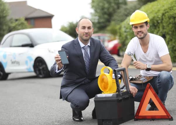Newtownabbey entrepreneur Peter Layland, Co-Founder of Sortsy, at the launch of the new app with tradesman James Galloghly. INNT 28-595CON