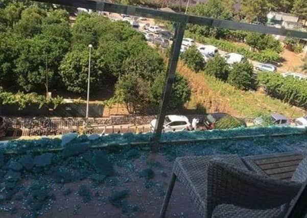 Glass on a hotel balcony was shattered in the military assault