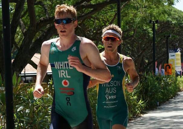 Russell White races his way to a second placed finish in a Continental Cup triathlon in Asia.