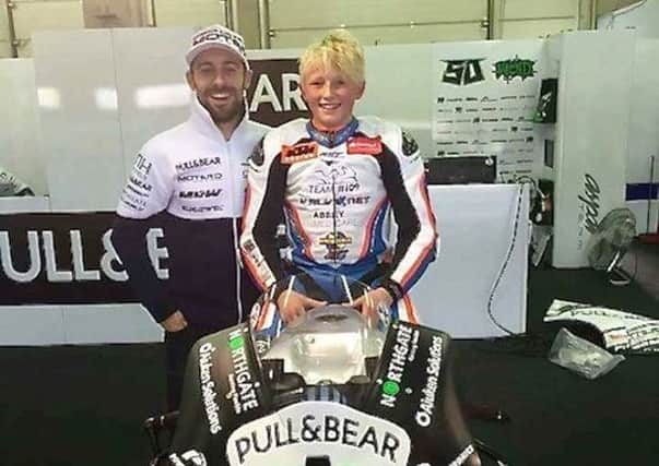 Scott Swann pictured with Eugene Laverty at the German MotoGP.  INLT 29-657-CON