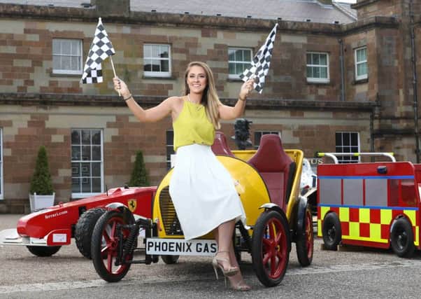 Oyster Pearl Shannon Graham gets set for the 2016 Phoenix Natural Gas Soapbox Derby which will be held at Hillsborough International Oyster Festival on Saturday 3rd September 2016 as part of the Festivals annual showcase. The Soapbox Derby is a highlight of the Festival with community and youth groups from all across Northern Ireland entering the race each year. The competition is calling for entries from racers of all ages and backgrounds who are keen to design and race their own soapbox at the event for a chance to win a variety of cash prizes as well as a surprise prize from Toyota which be unveiled in the weeks leading up to the race! Deadline to enter is Monday 19th August 2016. Full competition entry details and terms and conditions can be found at www.hillsboroughoysterfestival.com.Â  Completed entry forms should be sent to: Stephen Patterson, C/o ER Wilsons Grocers, 1 Main Street, Hillsborough, BT26 6AE. Picture by Darren Kidd / Press Eye.