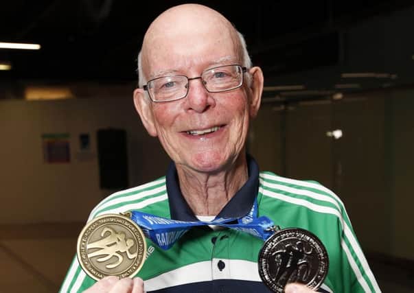 John McAleer with his silver and bronze medals.  INLT 29-662-CON