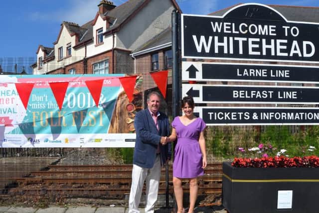 Jeremy Jones, chair of Whitehead Community Association thanks Veronica McKinney of Translink for their continued support of the Whitehead Summer Festival.  INCT 29-731-CON