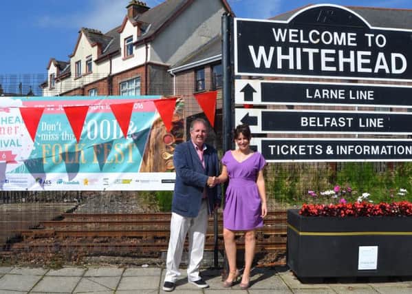 Jeremy Jones, chair of Whitehead Community Association thanks Veronica McKinney of Translink for their continued support of the Whitehead Summer Festival.  INCT 29-731-CON