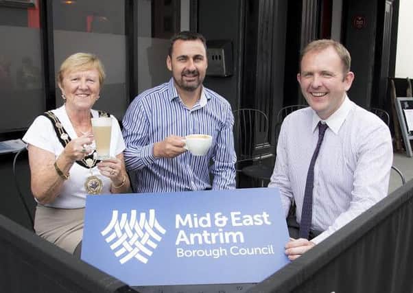 Mayor of Mid and East Antrim Borough, Councillor Audrey Wales, enjoys some cafÃ© culture at Sozo, North Street, Carrickfergus with the restaurants Darren Stewart and Owen Fulton from the councils Environmental Health department.  INCT 30-724-CON