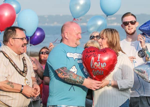 Mayor John Scott, Alan Drennan Snr, his wife Verona and son Lee release balloons during the memorial event for 'young Alan'.  INNT 29-501-SO