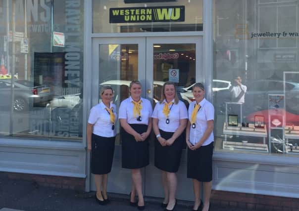 Store Manager Maggie Hope (second right) with staff (l-r) Shauna McShane, Lisa Elwood, and Amanda ONeill all ready to go at the Money Shops new store.