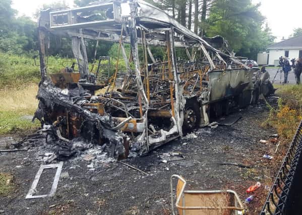Damage caused to a  bus belonging to  Dervock Young Defenders flute band, outside an Orange hall on the Carncullagh Road in Co Antrim.
 Pic: Pacemaker