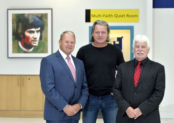 Local artist Paul Wilson, a lecturer at NRC Newtownabbey, at the unveiling of his new artwork at George Best Belfast City Airport with Brian Ambrose, CEO of the City Airport and Sammy Douglas MLA. INNT 30-506CON
