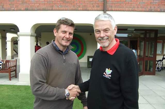 Kerry McCluskey (left) was receiving plenty of congratulations at Banbridge GC last weekend after a second place finish. Congratulating him is Past Captain Bill McCandless.