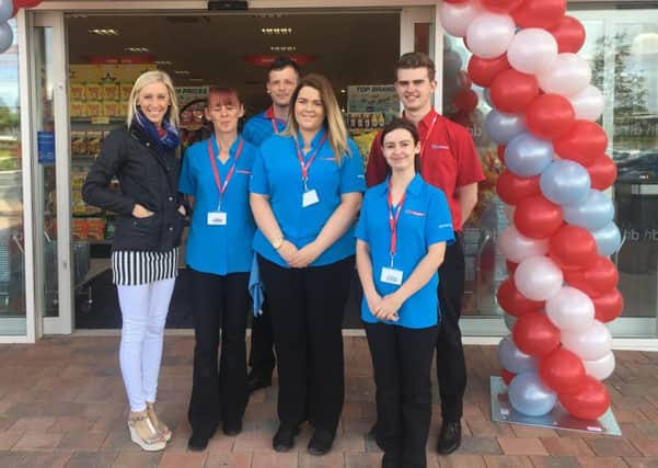 Carla Lockhart MLA with staff at the opening of Home Bargains store