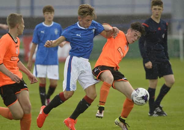 Presseye Belfast - Northern Ireland - 25th July 2016
Photograph:Stephen Hamilton

SuperCup NI 2016  
Junior Section match between Rangers and Co Armagh at Coleraine Showgrounds.

Rangers Billy Gilmour in action with Armaghs Scott McCann