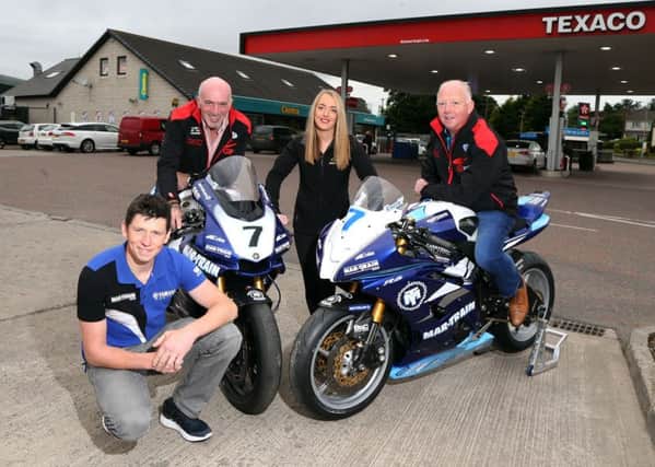 Dan Kneen launching a new sponsorship with the MCE Insurance Ulster Grand Prix and Whitemountain Centra Service Station, who are backing Supersport race one at the event in August.

L-R: Dan Kneen, Noel Johnston, Clerk of the Course at the MCE Ulster Grand Prix, Danielle Finlay and Sam Finlay, Whitemountain Centra Service Station.