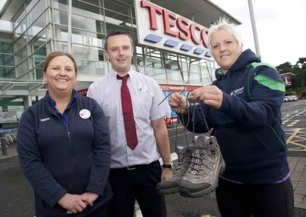 Vicki Carson, Exercise Referral Leader, and Tesco representatives Stacey Beattie and Chris Hutchinson launch the Tesco Walking Group in Newtownabbey. INNT 31-500CON