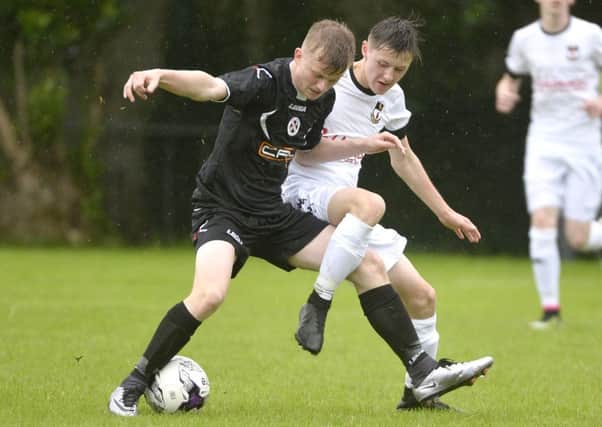 Chris Hutchinson (left) on the ball for County Armagh in the 5-1 victory over County Tyrone. Pic by PressEye Ltd.