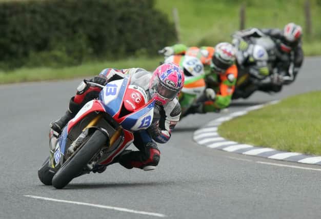 Lee Johnston (East Coast Construction Triumph) leads Glenn Irwin (Gearlink Kawasaki) and Ian Hutchinson (Team Traction Control Yamaha) at Quarry Bends during the second Supersport race at last year's Ulster Grand Prix.
PICTURE BY STEPHEN DAVISON INUS Ulster Grand Prix